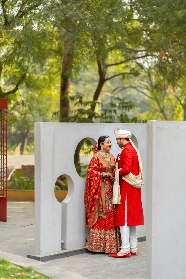 Indian couple in a red wedding ceremony